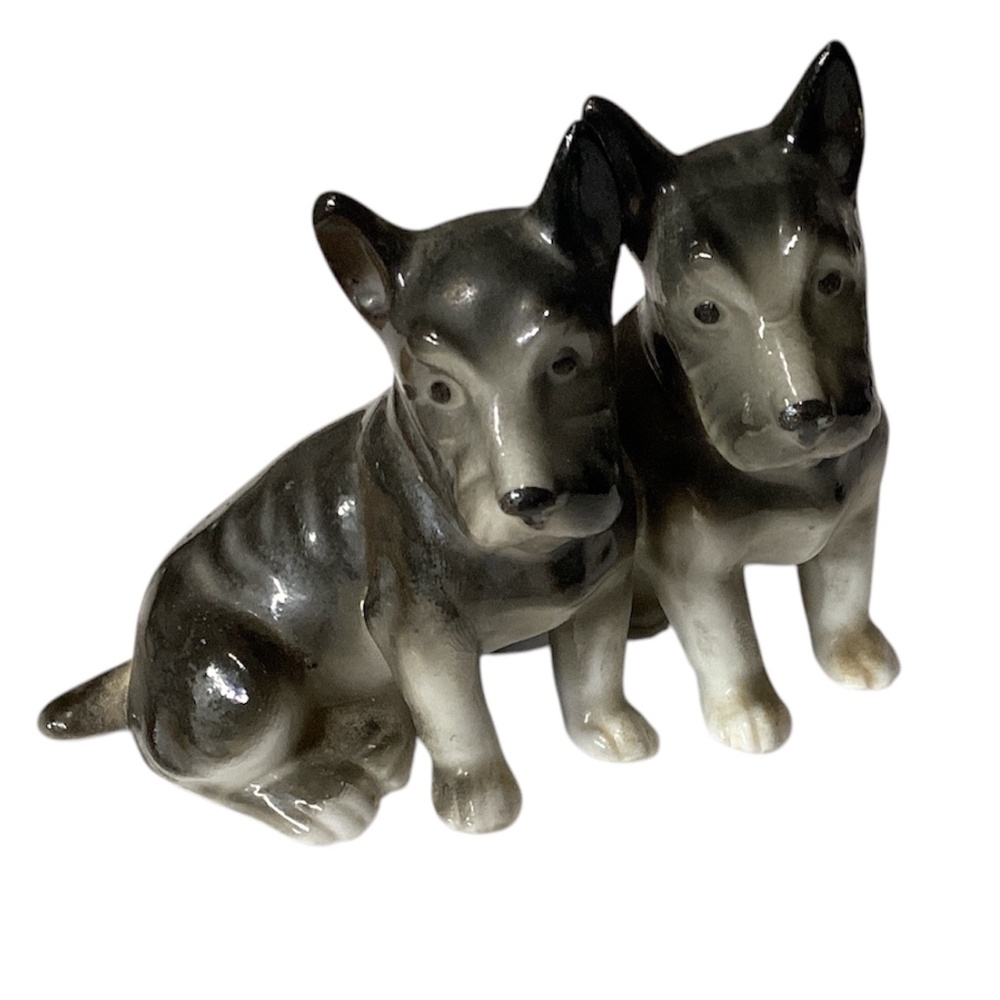 Porcelain miniature dog figurine